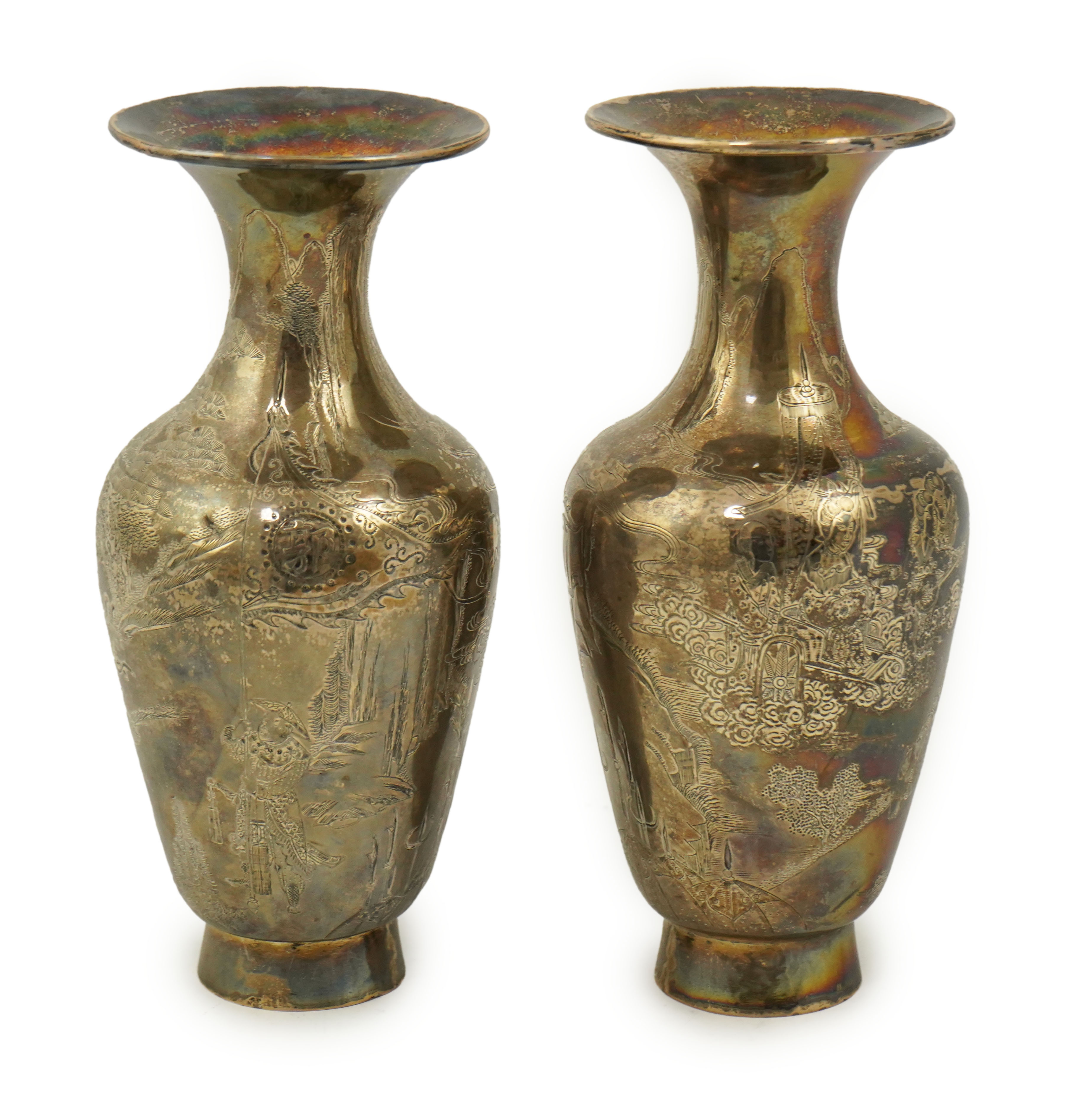 A pair of Chinese silver ‘immortals’ vases, late 19th century